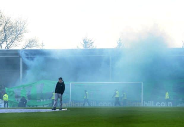 Aftermath of flares thrown at Stranraer during cup clash with Celtic