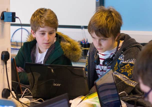 Youngsters take part at a recent Coderdojo held in Glasgow Science Centre. Picture: Claire Quigley