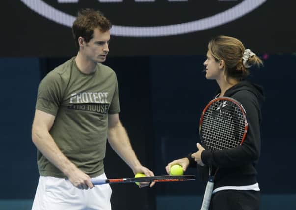 Andy Murray talks with coach Amelie Mauresmo during his practice session in Melbourne. Picture: AP
