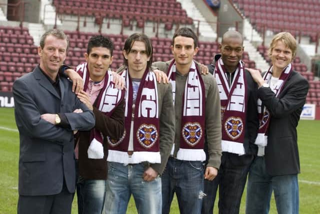 Then Hearts boss Graham Rix with five of the 11. From left to right: Bruno Aguiar, Mirsad Beslija, Chris Hackett, Jose Goncalves and Juho Makela. Picture: SNS