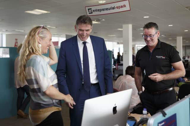 RBS Chief Executive Ross McEwan at Entrepreneurial Spark Glasgow chatting to Tracey Eker of Flexiworkforce and right Jim Duffy CEO Entrepreneurial Spark Glasgow. Picture: Robert Perry