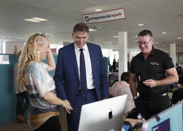 RBS Chief Executive Ross McEwan at Entrepreneurial Spark Glasgow chatting to Tracey Eker of Flexiworkforce and right Jim Duffy CEO  Entrepreneurial Spark Glasgow. Picture: Robert Perry