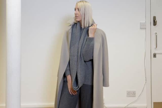 Long pale pink coat, Â£350; Grey tailored trousers, Â£143.50; Grey chunky knit, Â£120