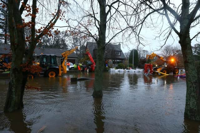 Flood water inundates streets in Aboyne in Aberdeenshire after heavy rain caused a local burn to burst its banks earlier this month. Picture: Getty
