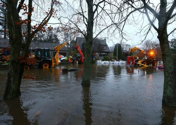 Flood water inundates streets in Aboyne in Aberdeenshire after heavy rain caused a local burn to burst its banks earlier this month. Picture: Getty