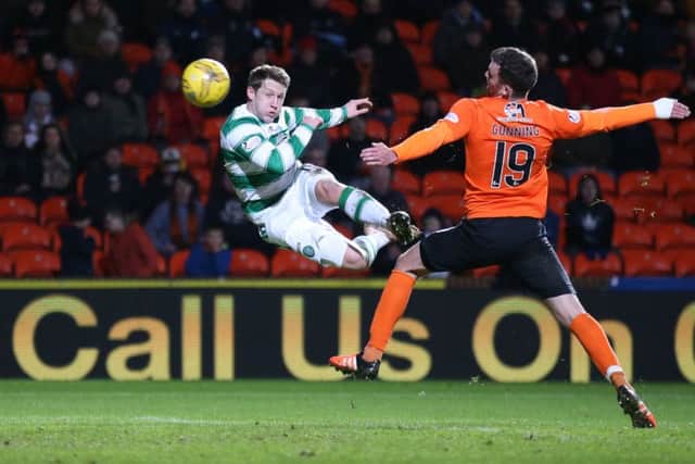 Kris Commons scores Celtic's fourth goal with a spectacular volley. Andrew Milligan/PA Wire