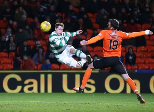 Kris Commons scores Celtic's fourth goal with a spectacular volley. Andrew Milligan/PA Wire