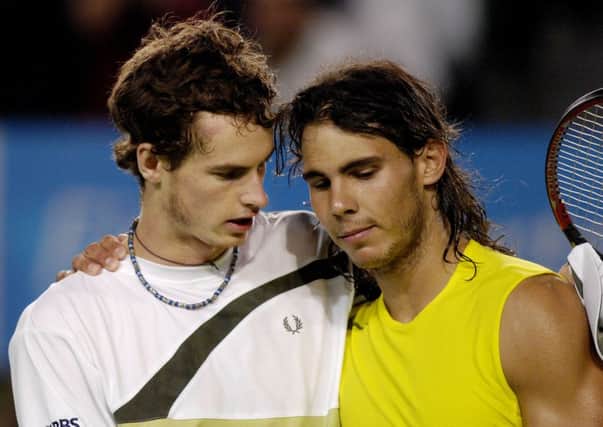 Andy Murray embraces Rafael Nadal after their gruelling fourth round match in 2007. Picture: AP