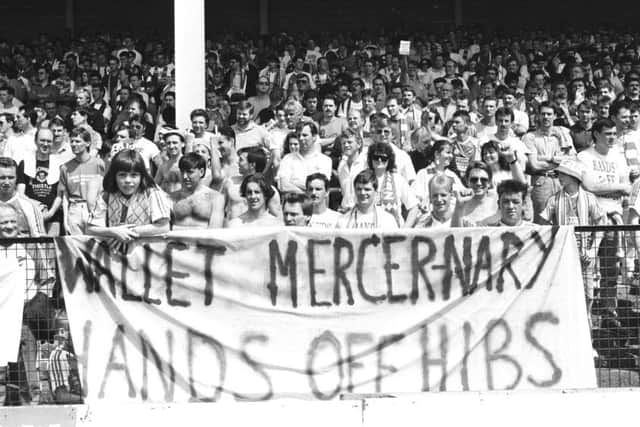 Hibs fans protest against Hearts chairman Wallace Mercers bold proposition to merge the two capital clubs to form an Edinburgh super-team in 1990.  Photograph: Crawford Tait