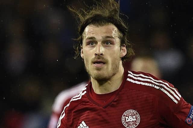 Denmark's defender Erik Sviatchenko eyes the ball during the friendly football match France vs Denmark, on March 29, 2015 at the Geoffroy-Guichard stadium in Saint-Etienne. AFP PHOTO / FRANCK FIFE (Photo credit should read FRANCK FIFE/AFP/Getty Images)