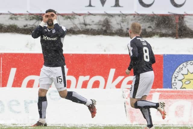 Kane Hemmings celebrates after scoring for Dundee. Picture: SNS Group