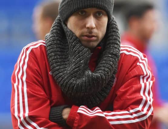 Hamilton's Brazilian defender Lucas Tagliapietra was feeling the cold in Perth. Picture: SNS Group