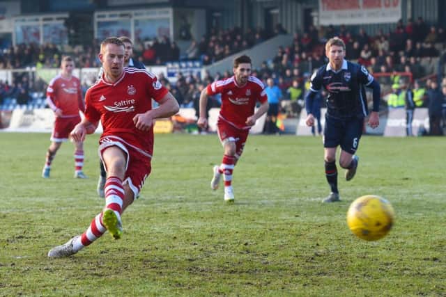 Aberdeen's Adam Rooney equalises against Ross County. Picture: SNS Group