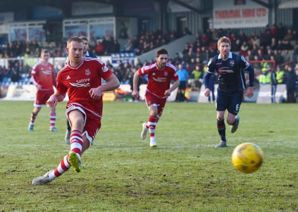 Aberdeen's Adam Rooney equalises against Ross County. Picture: SNS Group