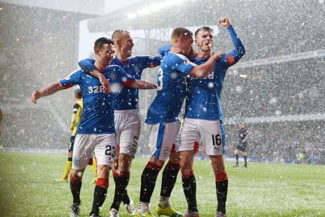 Martyn Waghorn, second right, celebrates his first goal. Picture: SNS