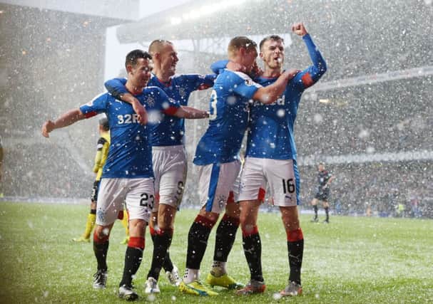 Martyn Waghorn, second right, celebrates his first goal. Picture: SNS