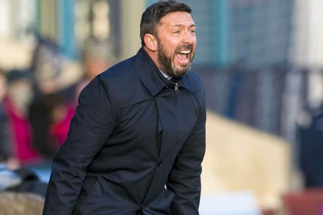 Aberdeen manager Derek McInnes roars out instructions during yesterday's win. Picture: SNS