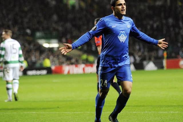 Mohamed Elyounoussi, seen here celebrating a goal against Celtic, is reportedly a target for Ronny Deila. Picture: AFP/Getty Images