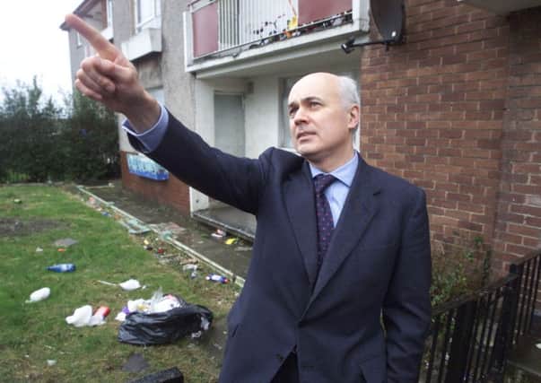 Conservative Secretary for Work and Pensions, Iain Duncan Smith takes in a view of Easterhouse.  Picture: Donald MacLeod