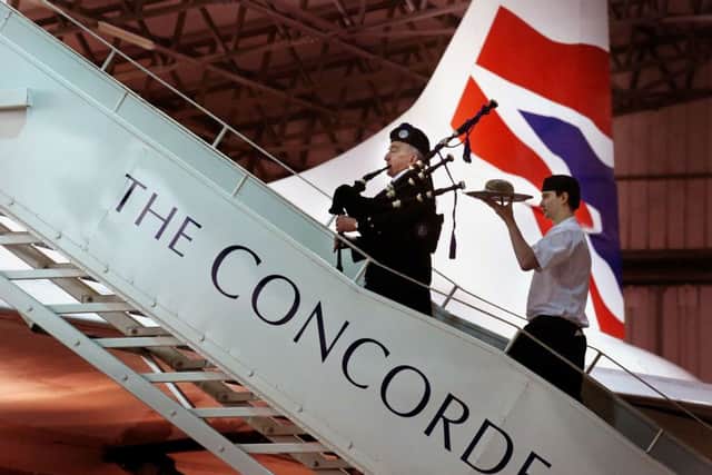 Piper David Leckie and chef Derek Johnstone board the G-BOAA Concorde at the National Museum of Flight in East Lothian, Scotland, to mark Concorde's 40th anniversary. Picture: PA