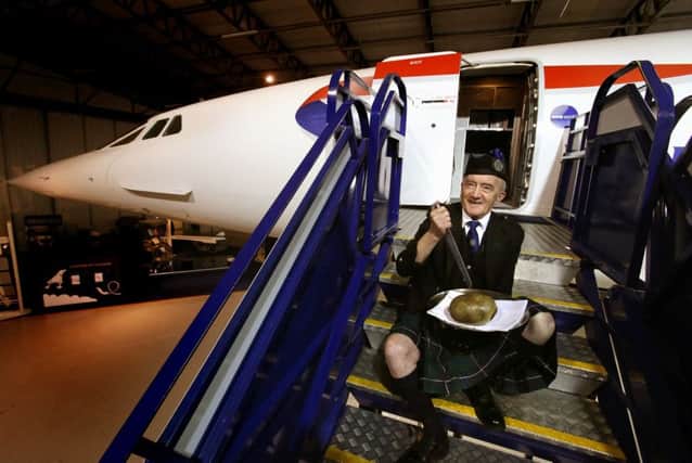 David Leckie and his haggis with the G-BOAA Concorde at the National Museum of Flight in East Lothian, Scotland, to mark Concorde's 40th anniversary. Picture: PA