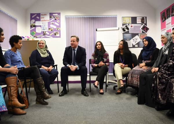 The Prime Minister spoke of his Â£20m language fund during a visit to a mosque and Bangladeshi womens project in Leeds. Picture: PA