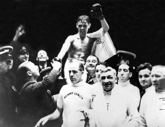 A triumphant Benny Lynch is carried off shoulder high after a fight at Shawfield Stadium, Glasgow, in 1937. The world flyweight champion boxer beat Englishman Peter Kane by knockout.