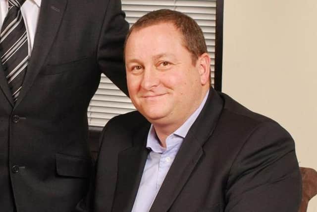 Mike Ashley's company have been in a legal dispute with Rangers. Picture: PA
