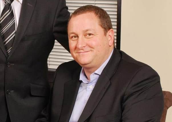 Mike Ashley's company have been in a legal dispute with Rangers. Picture: PA