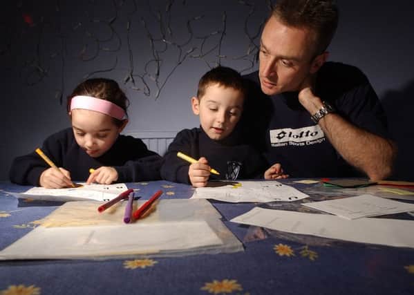 Parents are being encouraged to help their children with homework. Picture: Neil Hanna