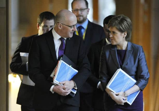 Finance Secretary John Swinney with First Minister Nicola Sturgeon. Picture: Neil Hanna