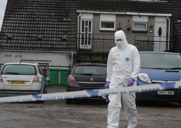 Police attend the scene at Greengates in Leven where 82-year-old Mary Logie's body was found. Picture: contributed