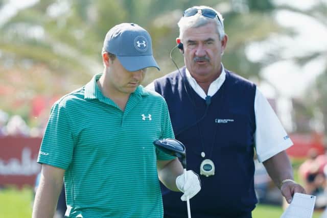 European Tour chief referee John Paramor warns Jordan Spieth about slow play on the final tee. Picture: Getty