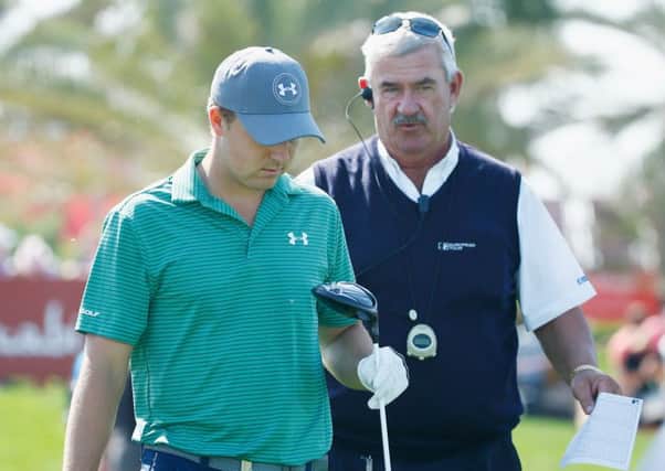 European Tour chief referee John Paramor warns Jordan Spieth about slow play on the final tee. Picture: Getty