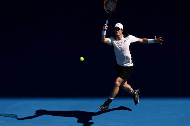 Andy Murray plays a forehand during his second-round demolition of big-serving Aussie Sam Groth. Picture: Getty