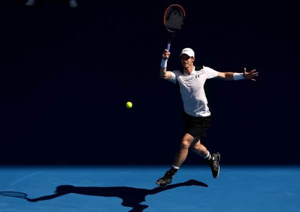 Andy Murray plays a forehand during his second-round demolition of big-serving Aussie Sam Groth. Picture: Getty
