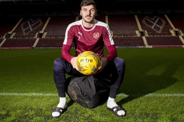 Head coach Robbie Neilson says Callum Paterson should develop at Hearts before heading south. Photograph: Craig Foy/SNS
