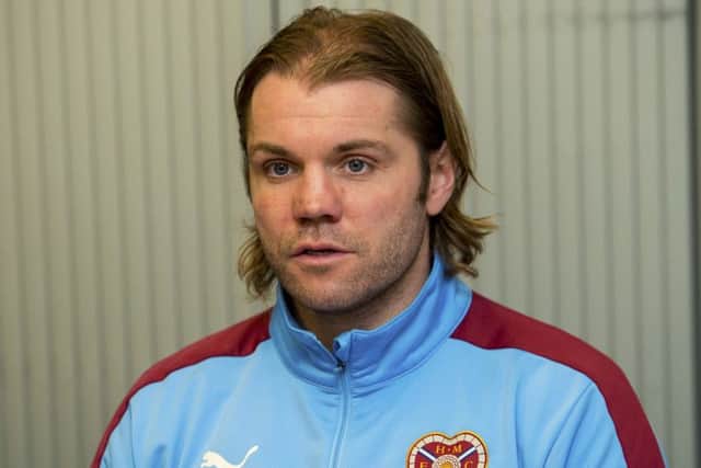 Hearts are looking to get their manager tied down on a long-term deal. Picture: SNS