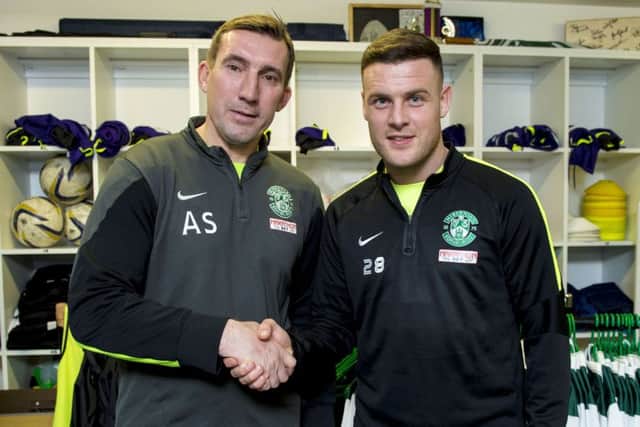 Hibernian manager Alan Stubbs (left) unveils his newest signing Anthony Stokes. Picture; SNS