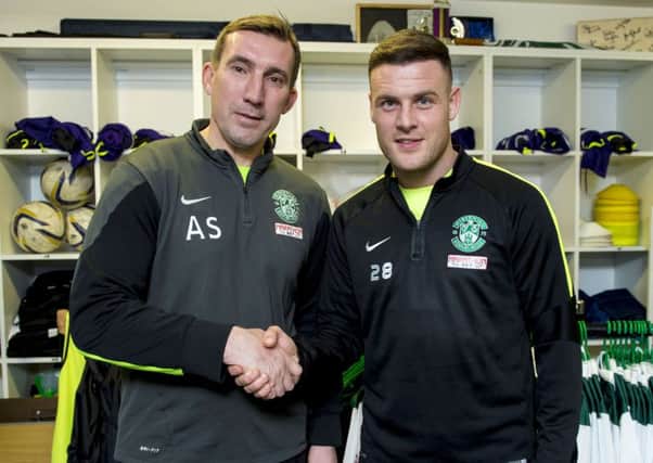 Hibernian manager Alan Stubbs (left) unveils his newest signing Anthony Stokes. Picture; SNS