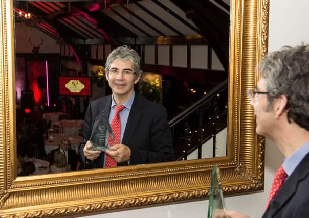 David Nott with his Robert Burns Humanitarian Award at the Brig ODoon Hotel in Alloway, South Ayrshire. Picture: South Ayrshire Council