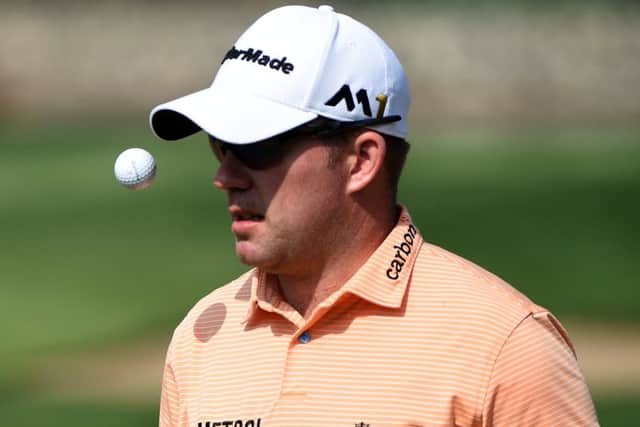 Richie Ramsays switch to orange on course coincided with a blistering round of 66 yesterday. Picture: Getty