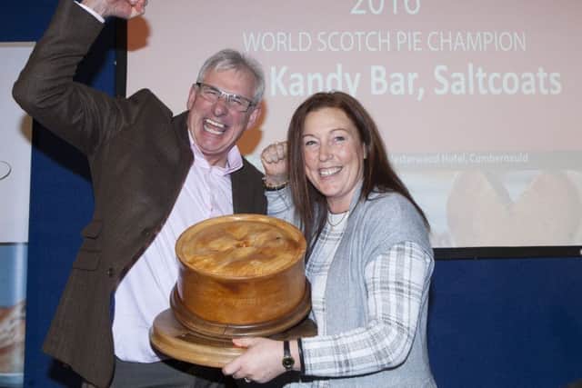Stephen and Rona McAllister, owners of The Kandy Bar in Saltcoats, celebrate being named overall champion at the 17th World Scotch Pie Championships. Picture: Katielee Arrowsmith