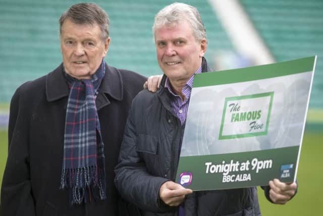 Hibs players John Fraser, left, and Peter Cormack at Easter Road to publicise the TV programme about the clubs Famous Five forward line. The ones who saw, they feel sorry for the young supporters, says Fraser, 79.
Photograph: Jeff Holmes/JSHPix