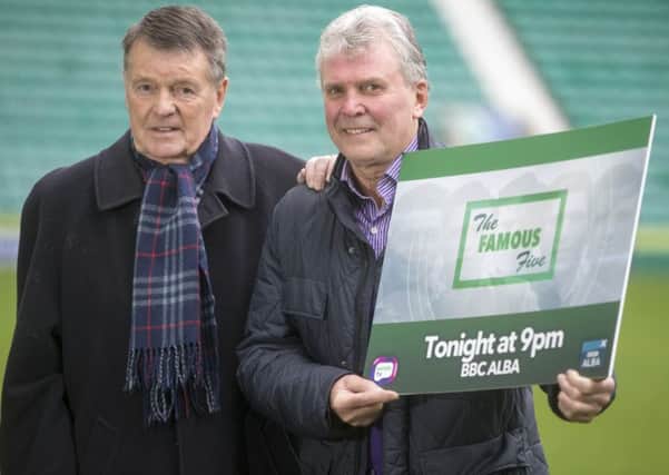 Hibs players John Fraser, left, and Peter Cormack at Easter Road to publicise the TV programme about the clubs Famous Five forward line. The ones who saw, they feel sorry for the young supporters, says Fraser, 79.
Photograph: Jeff Holmes/JSHPix