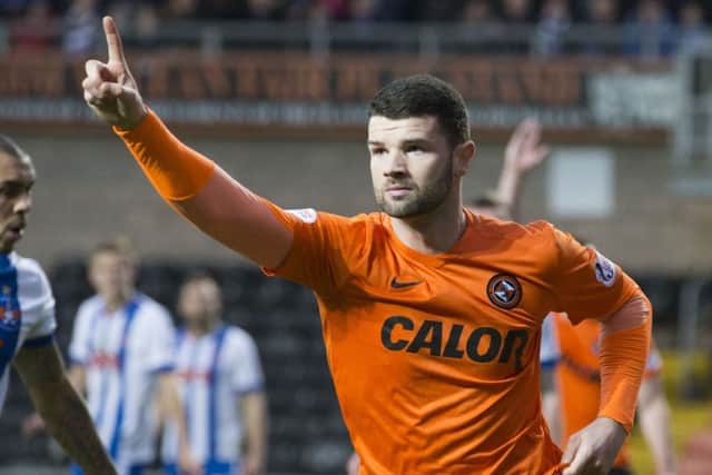 Dundee United's Mark Durnan celebrates having doubled the lead for his side. Picture: SNS