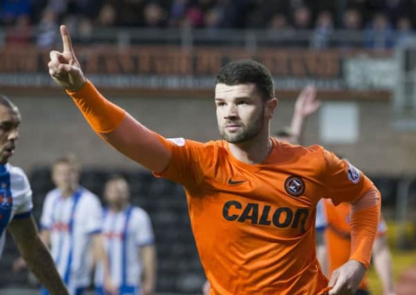 Dundee United's Mark Durnan celebrates having doubled the lead for his side. Picture: SNS