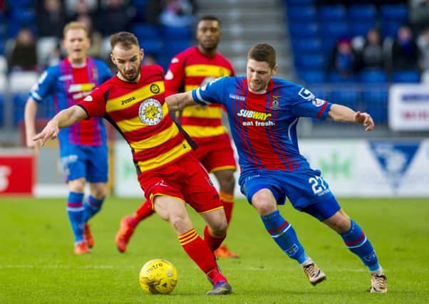 Partick Thistle's Abdul Osman and Inverness CT's Iain Vigurs in action. Picture: SNS
