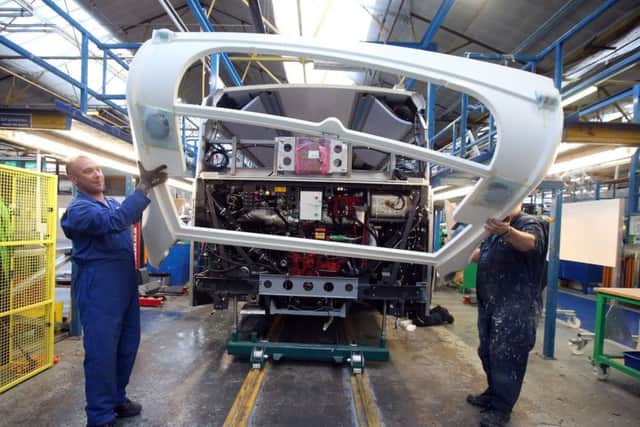 Workers at the Alexander Dennis plant in Falkirk. Picture: Andrew Milligan/PA Wire