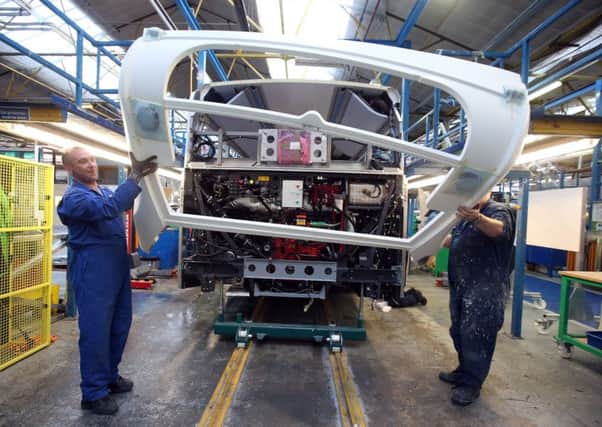 Workers at the Alexander Dennis plant in Falkirk. Picture: Andrew Milligan/PA Wire